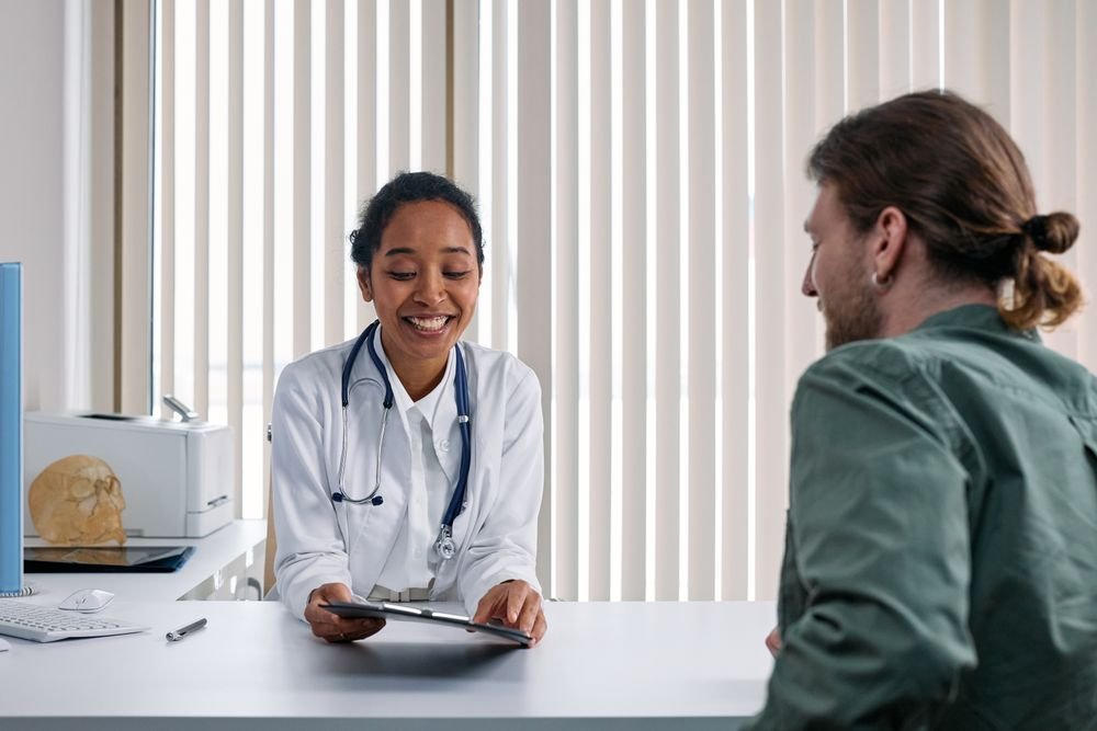 A warm, attentive conversation between a doctor and a patient